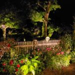 The Illuminators Outdoor Lighting-Trellis-Flowers-Trees-Fence